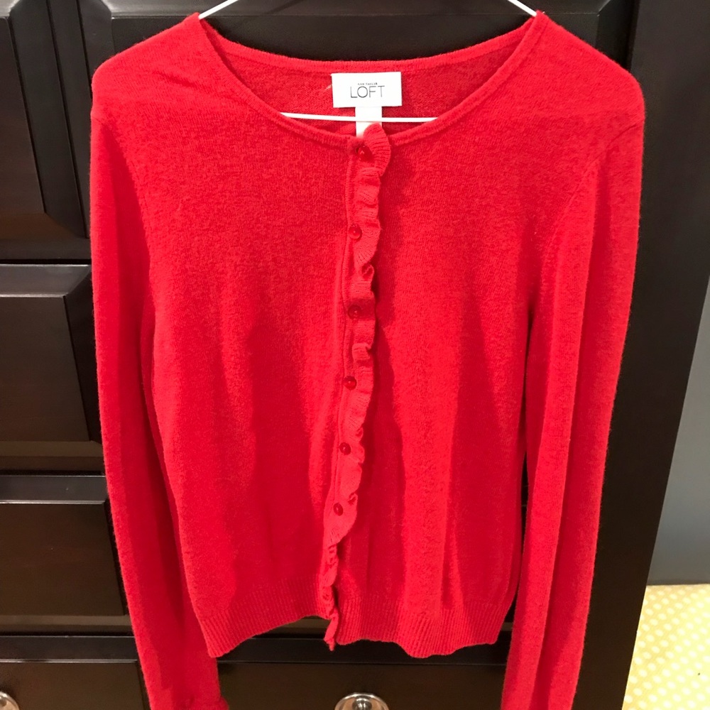 Red cardigan sweater with ruffle trim